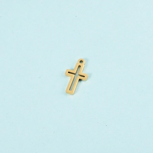 Detailed view of a gold hollow cross pendant with a hanging hole on a blue background