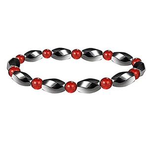 Close-up of magnetic hematite beads with polished metallic finish and red accent beads