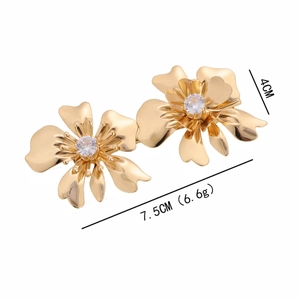 Gold flower stud earrings with 5-petal hollow design and central cubic zirconia crystals