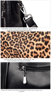 Detail of leopard print fabric, silver metal hook, and black lychee leather on tote bag