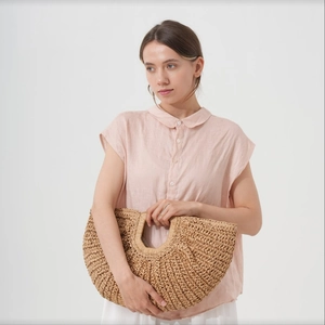 Handwoven straw tote bag for women, large half-moon beach handbag in natural wood color