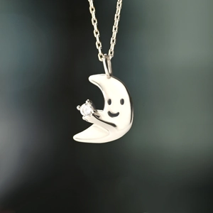Minimalist S925 silver crescent moon necklace with smiling face and white zircon stone