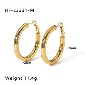 Detail view of 39mm 18K gold plated chunky hoop earrings with 5mm tube thickness specs