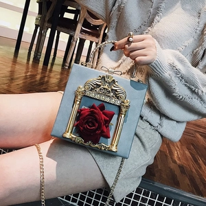 Blue-grey box handbag with golden floral relief and red 3D rose accent for women