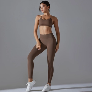 Detail of high-stretch mocha seamless yoga set showing V-back sports bra and leggings