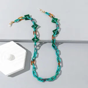 Colorful acrylic eyeglass chain with geometric links in blue, amber, and green tones