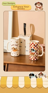 Detailed view of happy puppy ceramic mug sets in red checkerboard and cream patterns with gift box