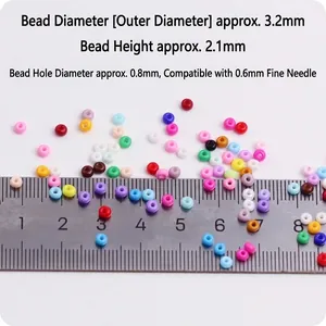 Colorful 3mm glass seed beads with ruler showing 3.2mm diameter and 0.8mm hole size