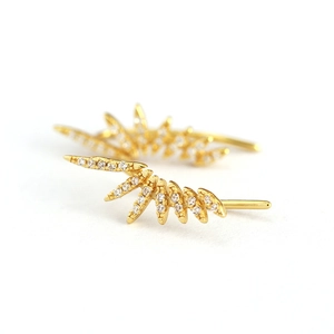 Luxurious gold sunburst stud earrings with sparkling micro-pave cubic zirconia crystals