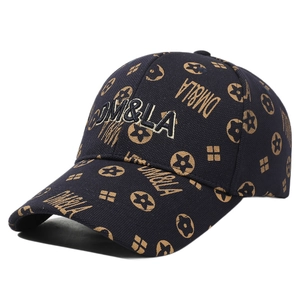 Navy blue baseball cap with gold DM&LA embroidery and monogram pattern