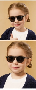 Kids black silicone sunglasses worn by a model in a warm-toned outdoor fashion shot
