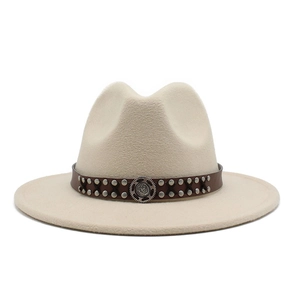 Detail of off-white wool fedora with brown studded leather band and vintage metal buckle