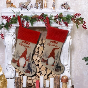 Christmas stockings with gnomes hanging on a decorated fireplace for holiday decor