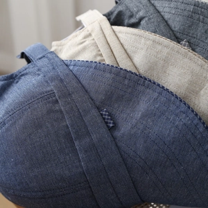 Chic wide-brim cotton sun hats in solid colors showing premium textured fabric layers