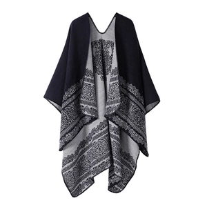 Double-sided paisley knit poncho in dark blue and grey with elegant ethnic pattern