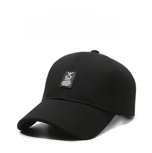 Detail of black breathable golf baseball cap with rectangular patch and wide sun visor