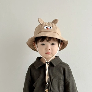 Beige baby sun hat with cute bird embroidery and 3D ears, featuring adjustable chin strap