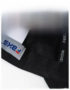 Detail of a black baseball cap featuring a widened moisture-wicking sweatband inside