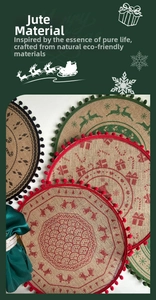 Macro detail of round jute placemat with pom-pom trim and festive Christmas print
