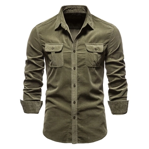 Men's olive green corduroy long sleeve shirt with dual chest pockets on white background
