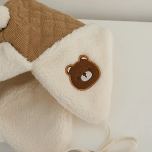 Winter infant bear earflap hat with warm lamb wool lining and brown corduroy quilting