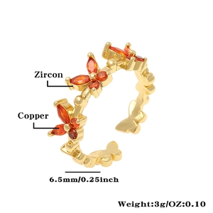 Detailed view of copper zircon butterfly ring showing 6.5mm size and 3g weight