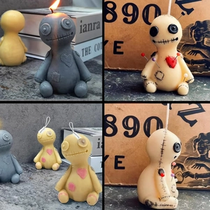 Voodoo doll scented candle mold with button eyes and stitched details in multiple colors
