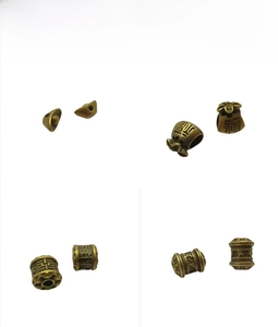 Detailed view of bronze-style brass spacer beads for DIY jewelry making and necklaces