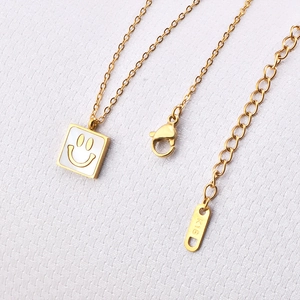 18K gold plated titanium necklace featuring a white square smiley face pendant on a thin chain