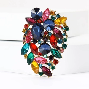 Exquisite gold alloy brooch featuring vibrant colorful rhinestones and glass crystals