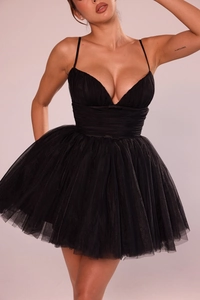 Detailed view of black mesh patchwork mini dress with layered tulle tutu skirt