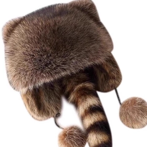 Winter faux fur raccoon hat with striped tail and plush balls for kids and adults