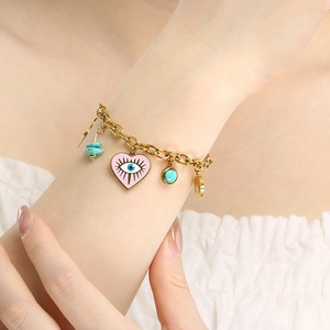 Goldene Gliederkette mit rosa Emaille-Herz, bösem Blick, Türkis-Perlen und Goldanhänger