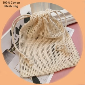 Eco-friendly cotton mesh bag with drawstring closure for sustainable storage and washing