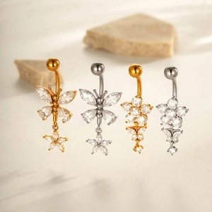 Surgical steel belly button rings with butterfly and flower pendants and cubic zirconia