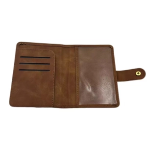 Internal layout of brown PU leather RFID passport holder with card slots and ID window