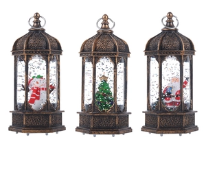 Close-up of vintage bronze Christmas lanterns with snowman, Santa, and tree inside