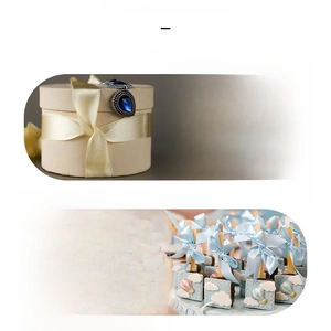 Detail of light gold and blue satin ribbons on gift boxes with a smooth glossy finish