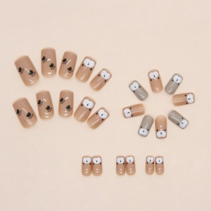 Cute bear paw print press-on nails in earth tones with short square round shape