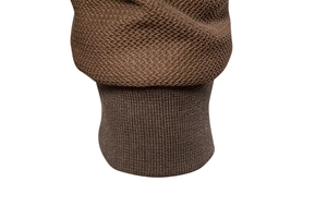 Detail shot of brown knit jacket featuring high-quality ribbed cuffs and textured mesh fabric
