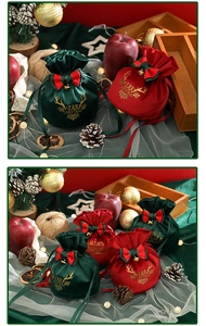 Detail of velvet Christmas gift bags with gold reindeer print, bells and bowknot decor