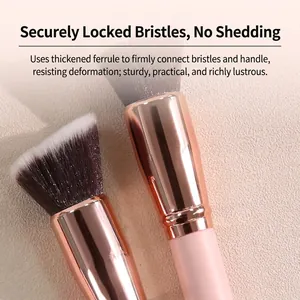 Flat and angled foundation makeup brushes with thick rose gold ferrules and pink handles