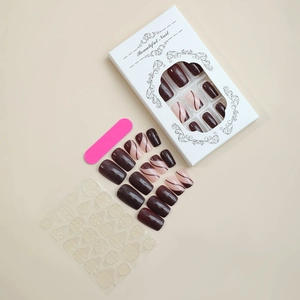 Brown vintage striped press-on nails set with nail file and adhesive stickers