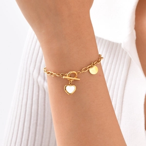 Gold stainless steel link chain bracelet with shell heart charm and toggle clasp