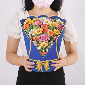 Detailed view of a 3D pop-up greeting card featuring a colorful paper flower bouquet