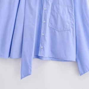 Stylish light blue long sleeve shirt for women featuring a single pocket and white buttons