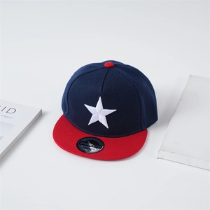 Kids navy and red snapback cap with white star embroidery on a clean white background