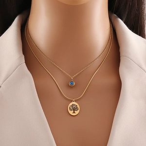 Double-layered gold stainless steel necklace with blue evil eye and tree of life charms