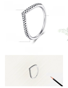 Macro detail of V-shaped 925 sterling silver ring with hand-set 5A cubic zirconia