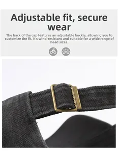 Close-up of bronze metal buckle and adjustable cotton strap on a washed baseball cap